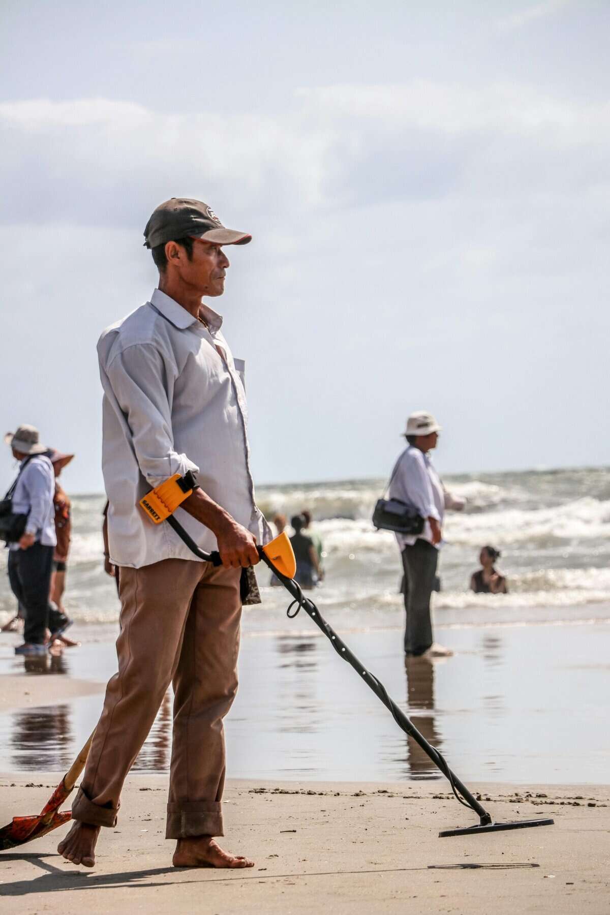 Man walking on seashore